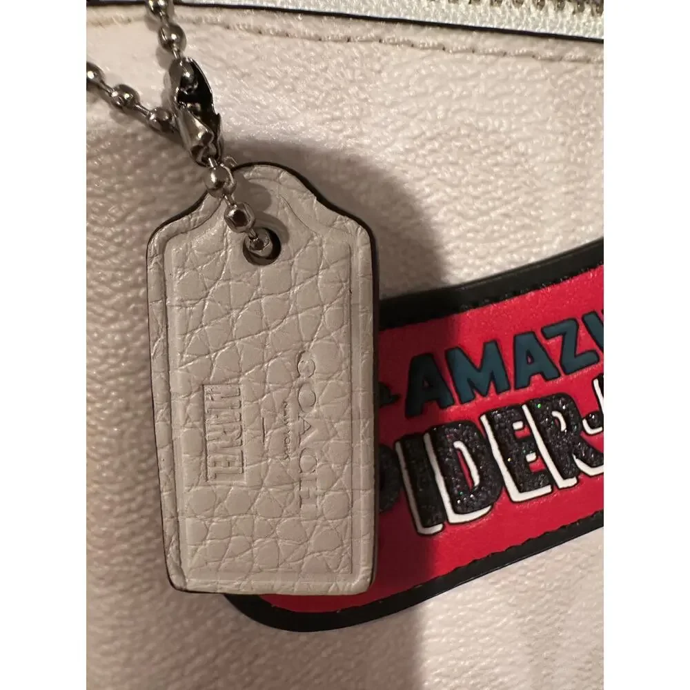 NWOT Coach x Marvel Gallery Pouch signature canvas Marvel patches wristlet